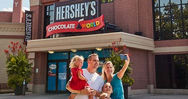 Family outside of chocolate world
