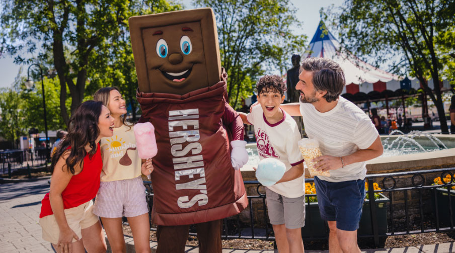 family with Hershey Bar character